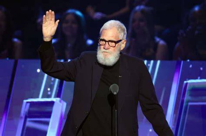 David Letterman stands out in yellow and orange with wife Regina Lasko