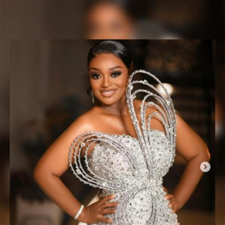 Jackie Appiah's son flaunts cash GhPage
