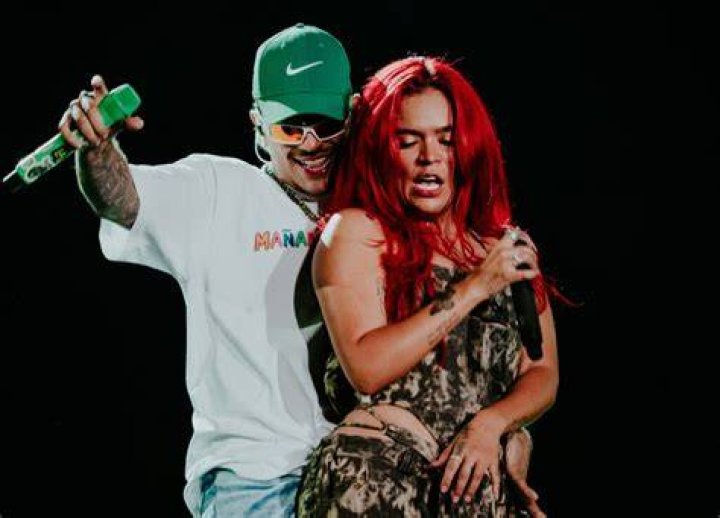 Karol G and Feid confirm relationship, hold hands at Miami concert