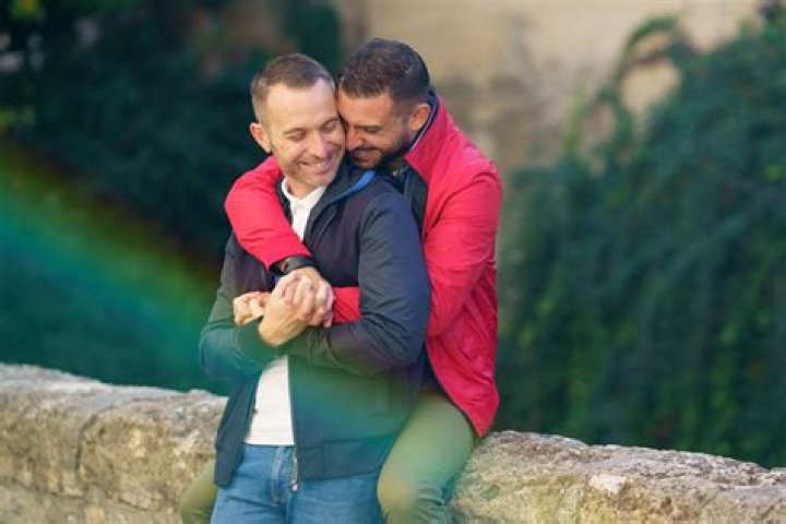 Two Men Hugging · Free Stock Photo